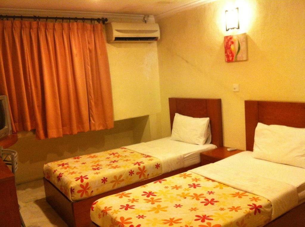 City Star Hotel Kulai Habitación foto